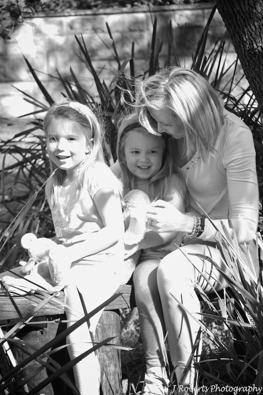 Mother and daughters together - family portrait photography